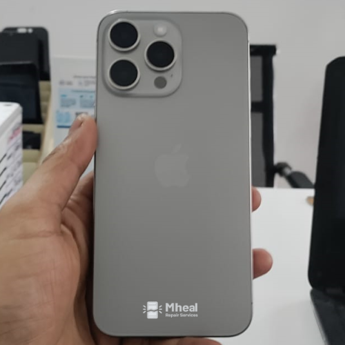 iPhone 15 Pro Max Natural Titanium After Back Glass Replacement By Mheal